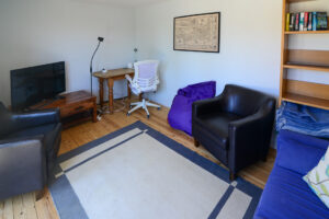 Garden room at San Marcos with a desk and TV