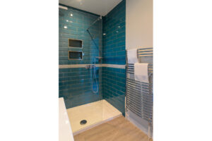 Walk in shower in the bathroom off of the utility room at San Marcos