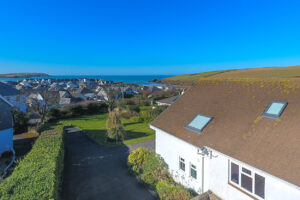 Aerial view from Tristan looking out over the ocean with Trevose Head in the background.