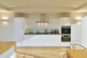 The kitchen area at Spin with built in oven and hob with extractor over