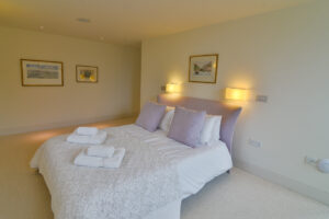 The master ensuite king bedroom on the lower ground floor at Spin which also has a dressing room