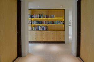 The dressing room for the Master bedroom at Spin with bookshelves and a selection of books