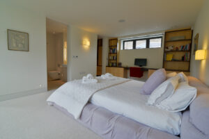 The second ensuite king bedroom on the lower ground floor at Spin with doors to the ensuite and dressing area