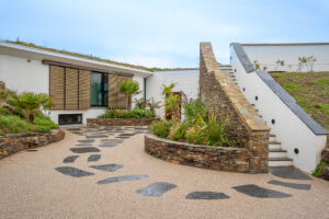 The courtyard area to the front door and steps to the roof terrace at Spin