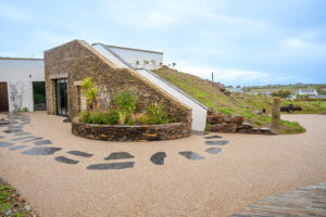 The parking area and courtyard at Spin with steps up to the roof terrace