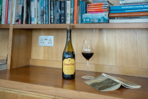 Bookshelf in the lounge are as Spin with a selection of reading material