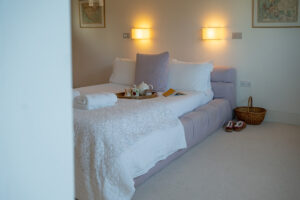 The king bed in the second lower ground floor bedroom at Spin