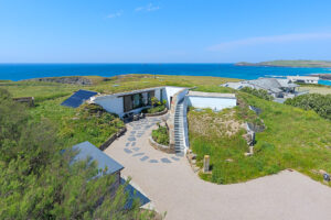Aerial view over Spin showing the courtyard and parking areas, roof terrace and panoramic views
