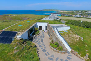 Aerial view over Spin towards Treyarnon Bay, Constantine Bay and Trevose Head