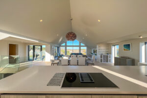 Open plan kitchen, dining area and lounge at Cornerstones