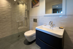 Walk in shower in utility area at Cornerstones