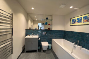 Main gound floor bathroom with separate bath tub at Cornerstones