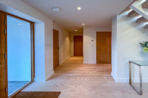 Hallway leading to ground floor bedrooms at Cornerstones