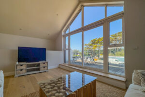 Sliding doors leading to balcony in the lounge at No 1 Treglos Gardens