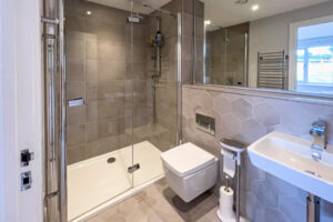 En suite bathroom on the ground floor at No 1 Treglos Gardens