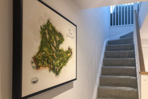 Stairs to 1st floor and wall art at Quiescence