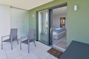 Ground floor ensuite bedroom from the patio at Quiescence
