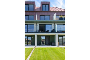 Exterior view of Quiescence from the grassed area outside the ground superking bedroom