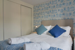 Ground floor king bedroom with built in wardrobes at Quiescence
