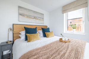Master ensuite superking bed at The Look Out with window to the side of the house
