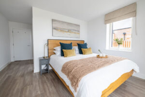 Master ensuite bedroom at The Look Out with window to the side