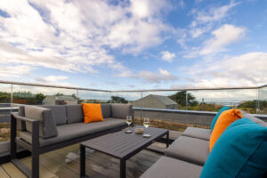 Outdoor sofa type seating on the first floor balcony at The Look Out