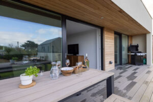 Patio at The Look Out with table and benches and barbeque