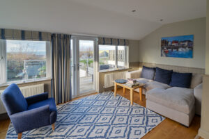 Conservatory area at Coronado with sofas and chairs