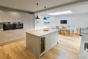 Open plan kitchen with island and dining area at Coronado