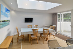 Dining area at Coronado with sliding doors to patio