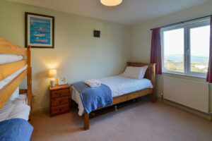 Bunk bed room with extra single bed and sea views on first floor at Coronado. The top bunk is only made up if requested