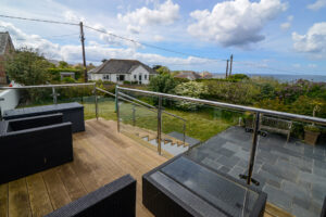 Views to the coast and the garden from the balcony at Coronado