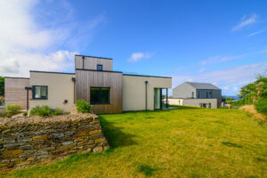 Exterior view of the side of The Look Out and the grassed lawn