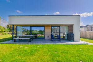 Patio at the rear of The Look Out with picnic table and benches