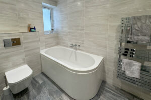Bath tub in family bathroom