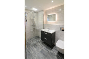 Ensuite bathroom with walk in shower on the ground floor at Morwynsow