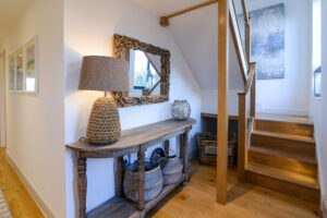 Entrance hall and staircase leading to the first floor at Morwynsow