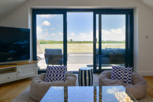 Siding doors in Morwynsow living room leading to the balcony