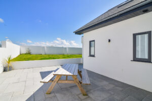 Exterior patio area with bench to the rear of Morwynsow