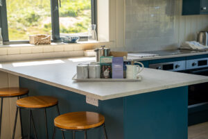 The breakfast bar in between the kitchen and dining areas at Tremblaze with a tea tray
