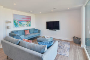 The lounge area at The View with seating and wall mounted tv