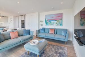 Comfortable seating and wall mounted tv in the lounge area at The View