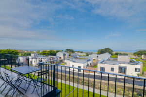 View over adjoining properties from the balcony to the ocean