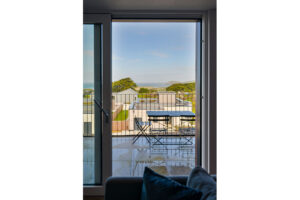 View from inside the sliding doors out over the balcony towards the ocean