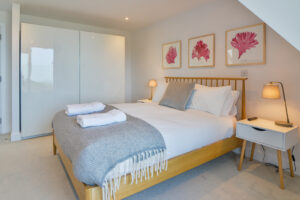 The second floor master ensuite king bedroom at The View with bedside tables and lamps