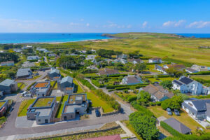 Aerial view from The View over the village, golf course and onwards to Trevose Head