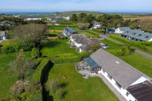 Exterior aerial view over Zefyros with Trevose Head in the background