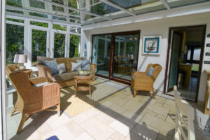 Conservatory at Zefyros with doors to the dining area and the kitchen
