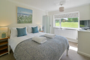 Ensuite master king bedroom at Zefyros with window to rear garden