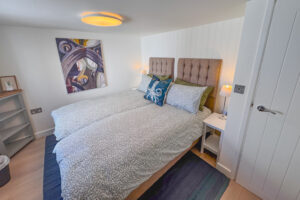 Twin beds in bedroom 2 at No 8 Sandhills which can be made as a king bed if requested. The beds are small singles